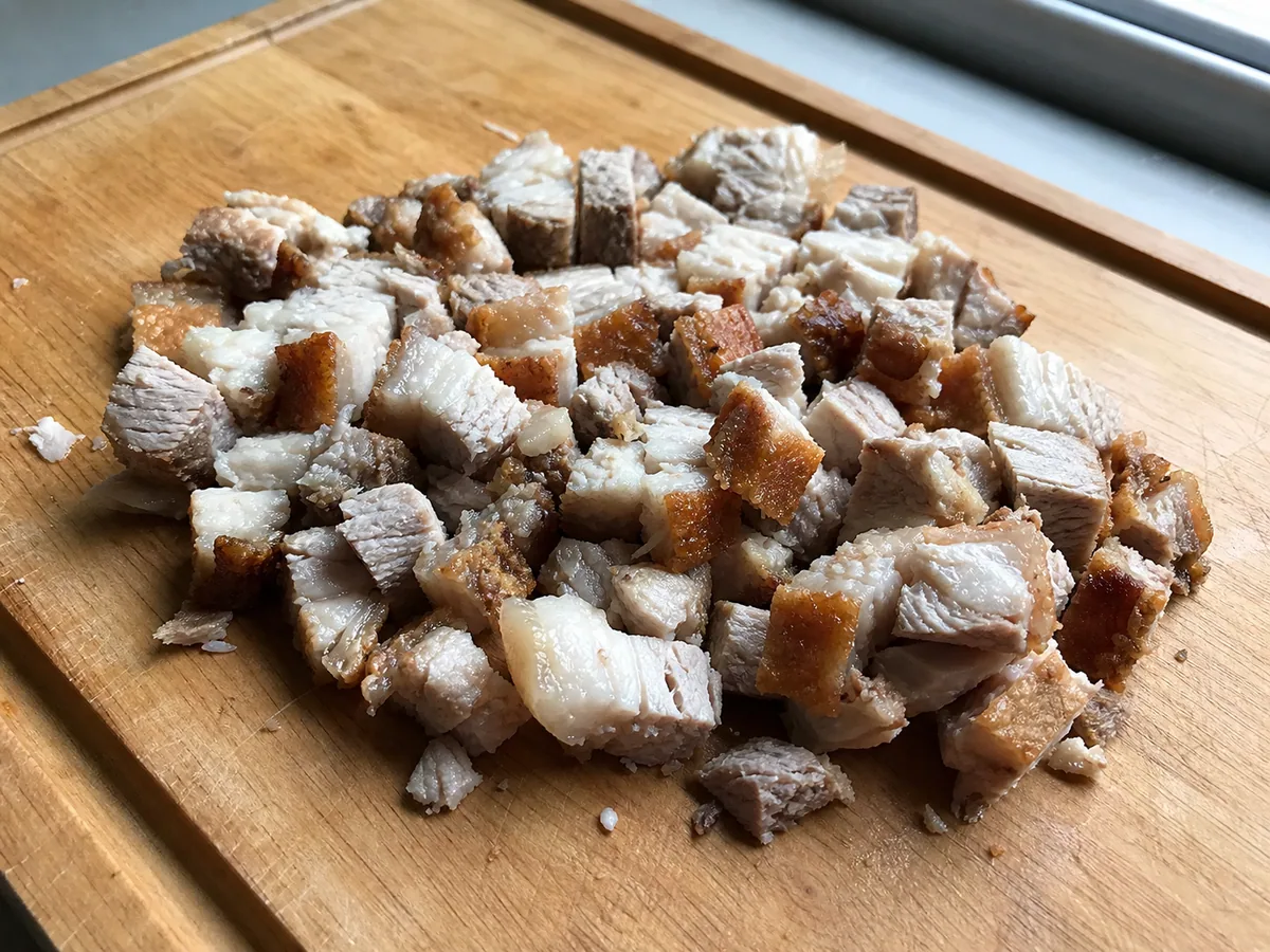 Fully cooked pork shoulder and pork belly dried and cut into irregular 1 to 1.5 cm pieces before crisping
