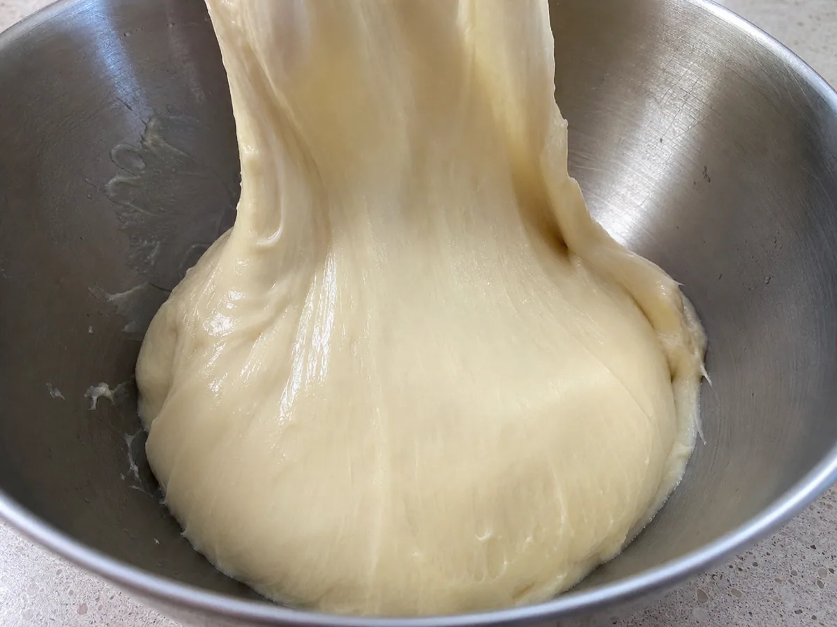 Glossy elastic bee sting cake dough after kneading