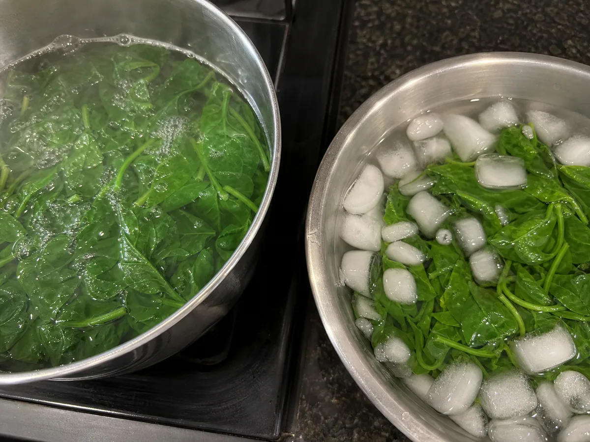Blanch and cool the spinach during preparation