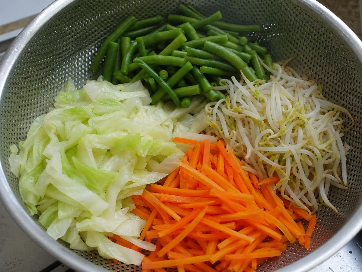 Blanch and drain the vegetables during preparation