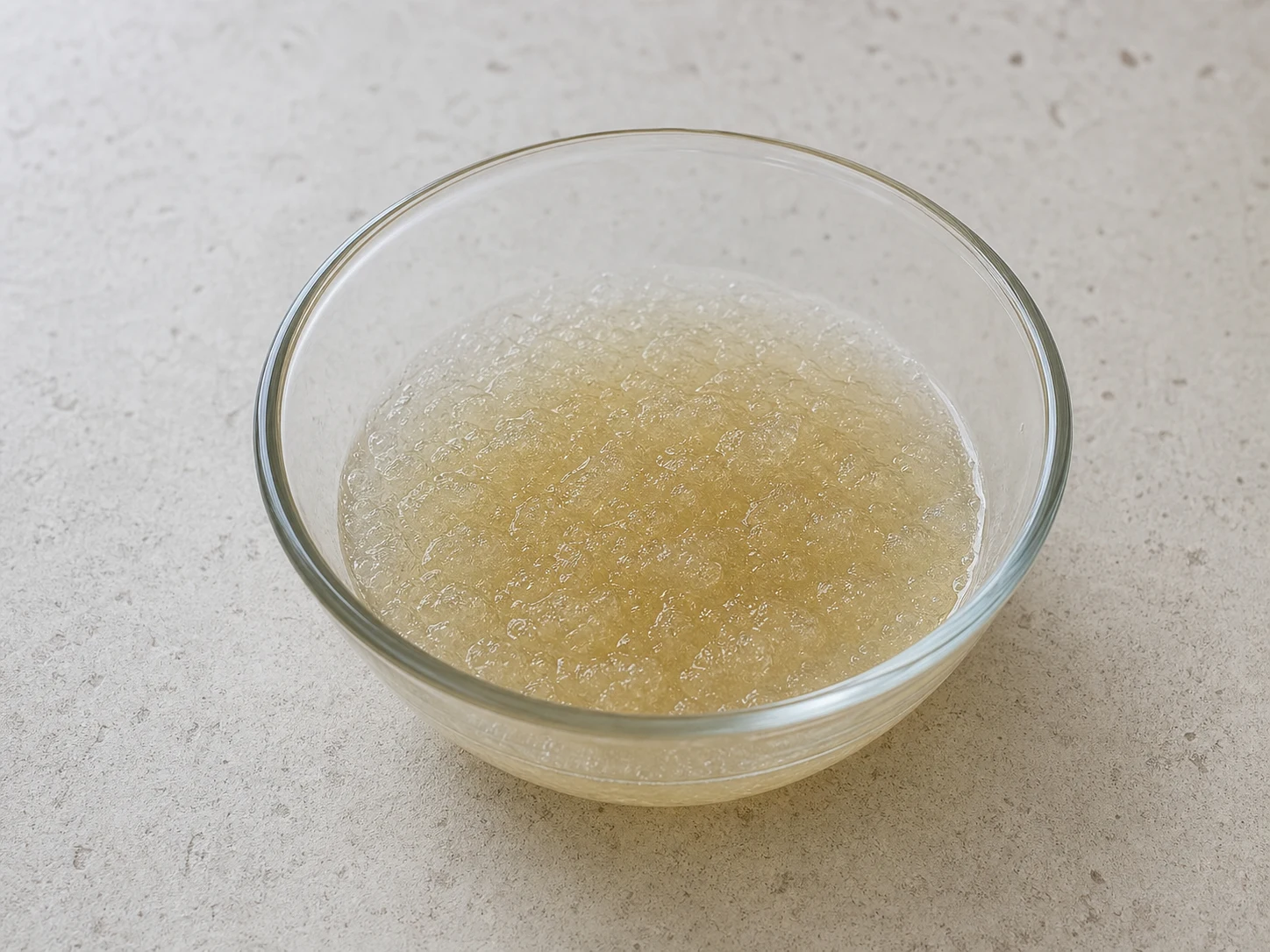 Powdered gelatin fully bloomed in cold water in a small heatproof bowl