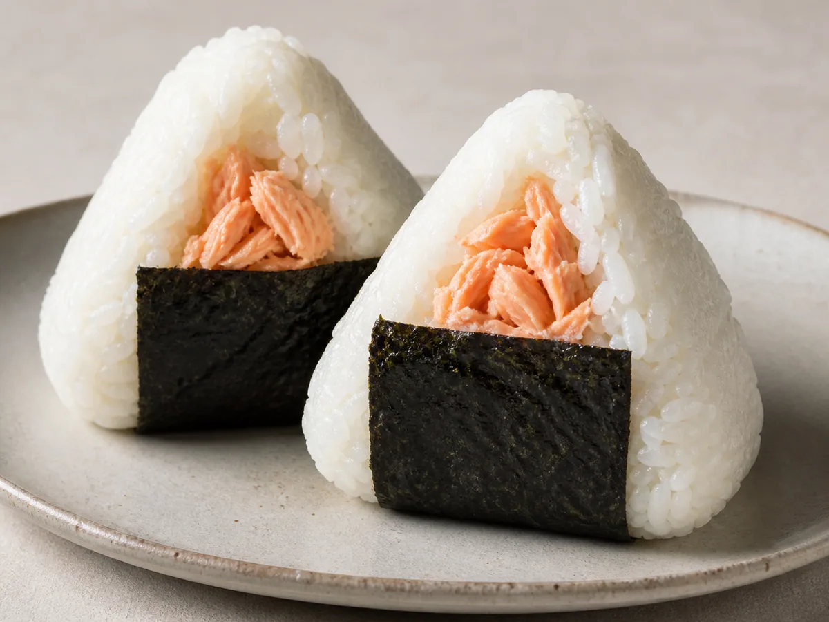 Fill, shape, and wrap the onigiri during preparation