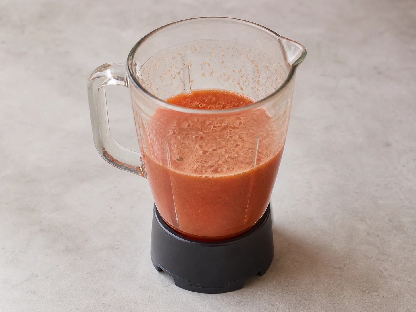 Smooth spiced tomato celery cooler inside a blender pitcher