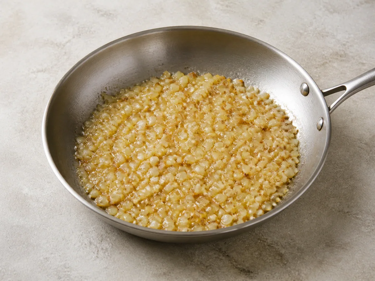 Deep golden diced onion in butter for pierogi poloneses de batata e cheese pierogi