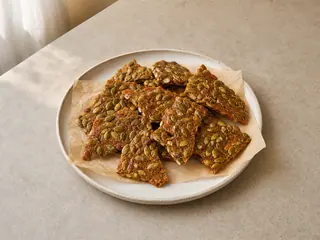 Amber panela pumpkin seed brittle broken into crisp shards