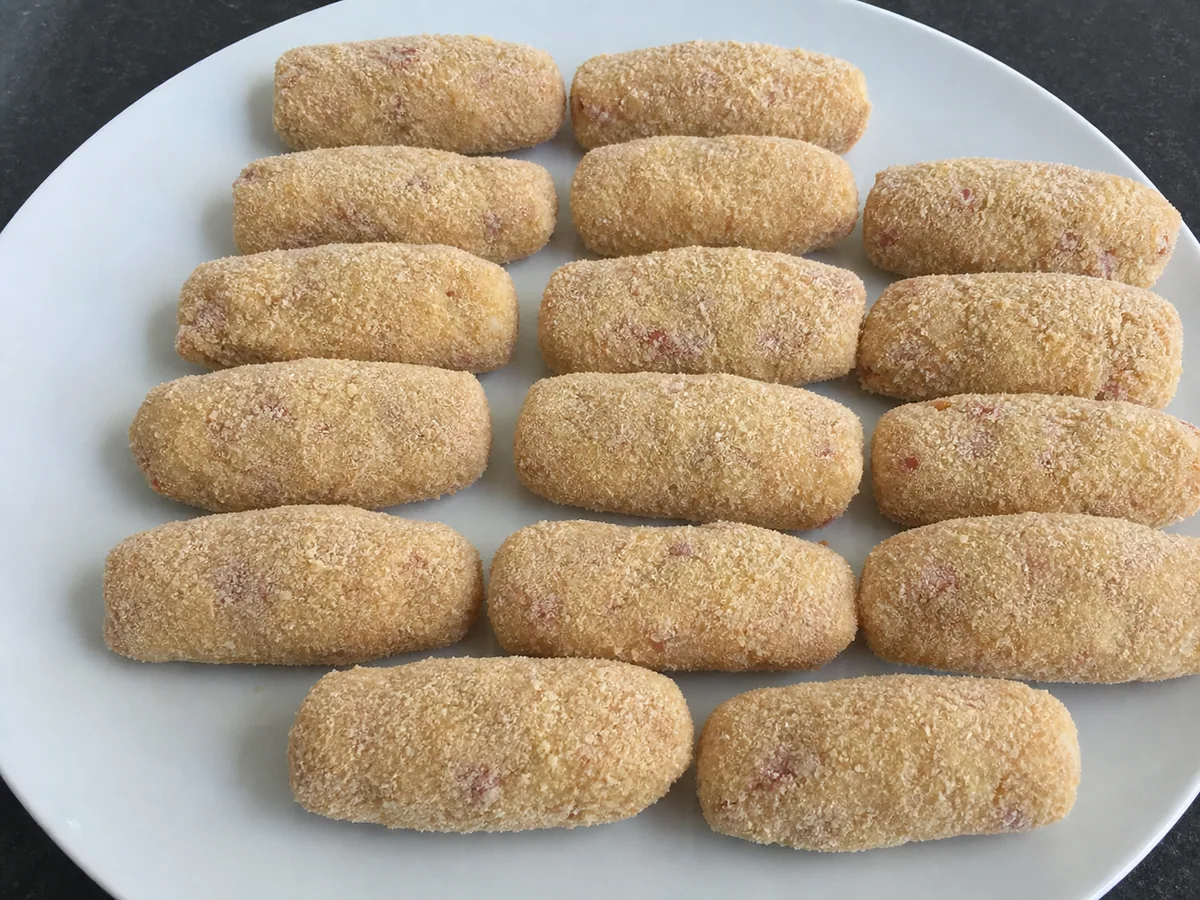 Shape and bread the croquettes during preparation