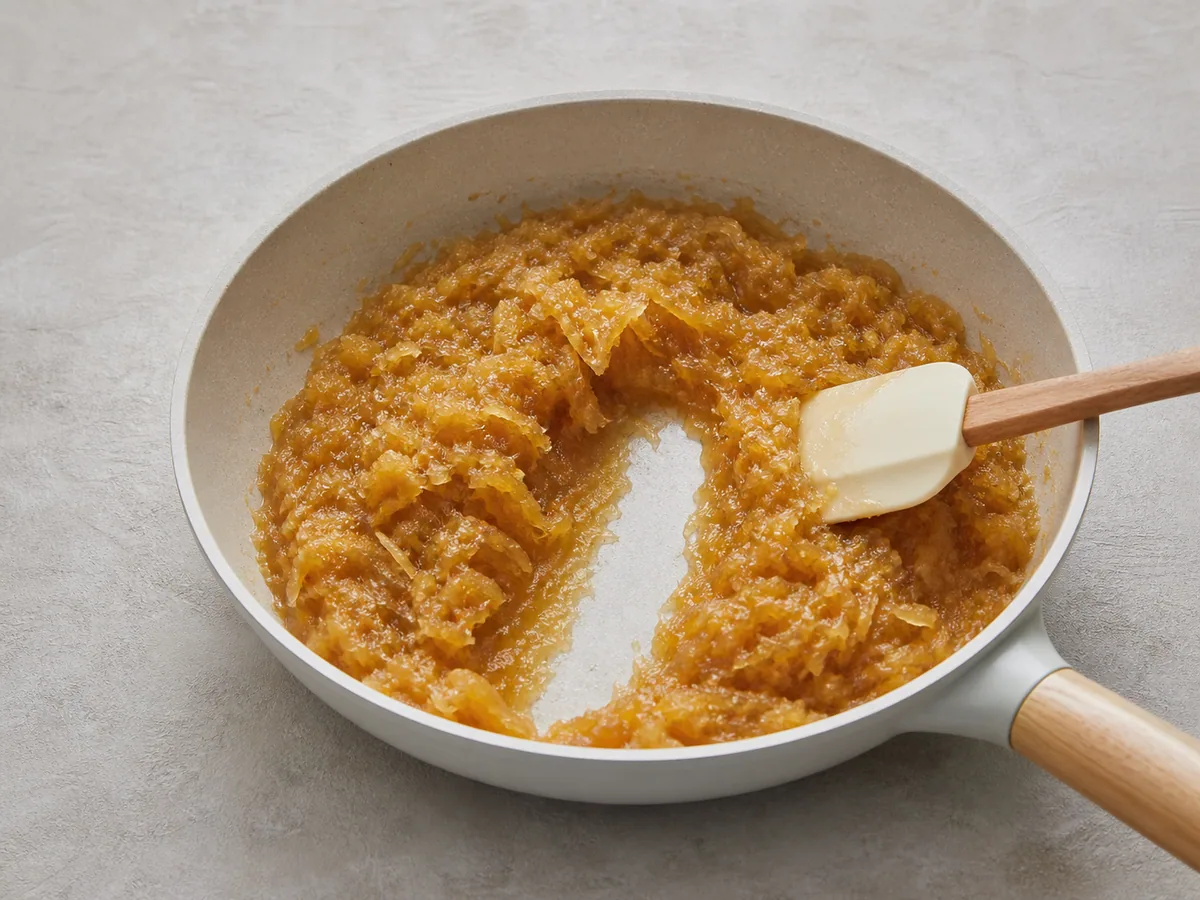 Thick Taiwanese pineapple cake filling leaving a clean path in a skillet